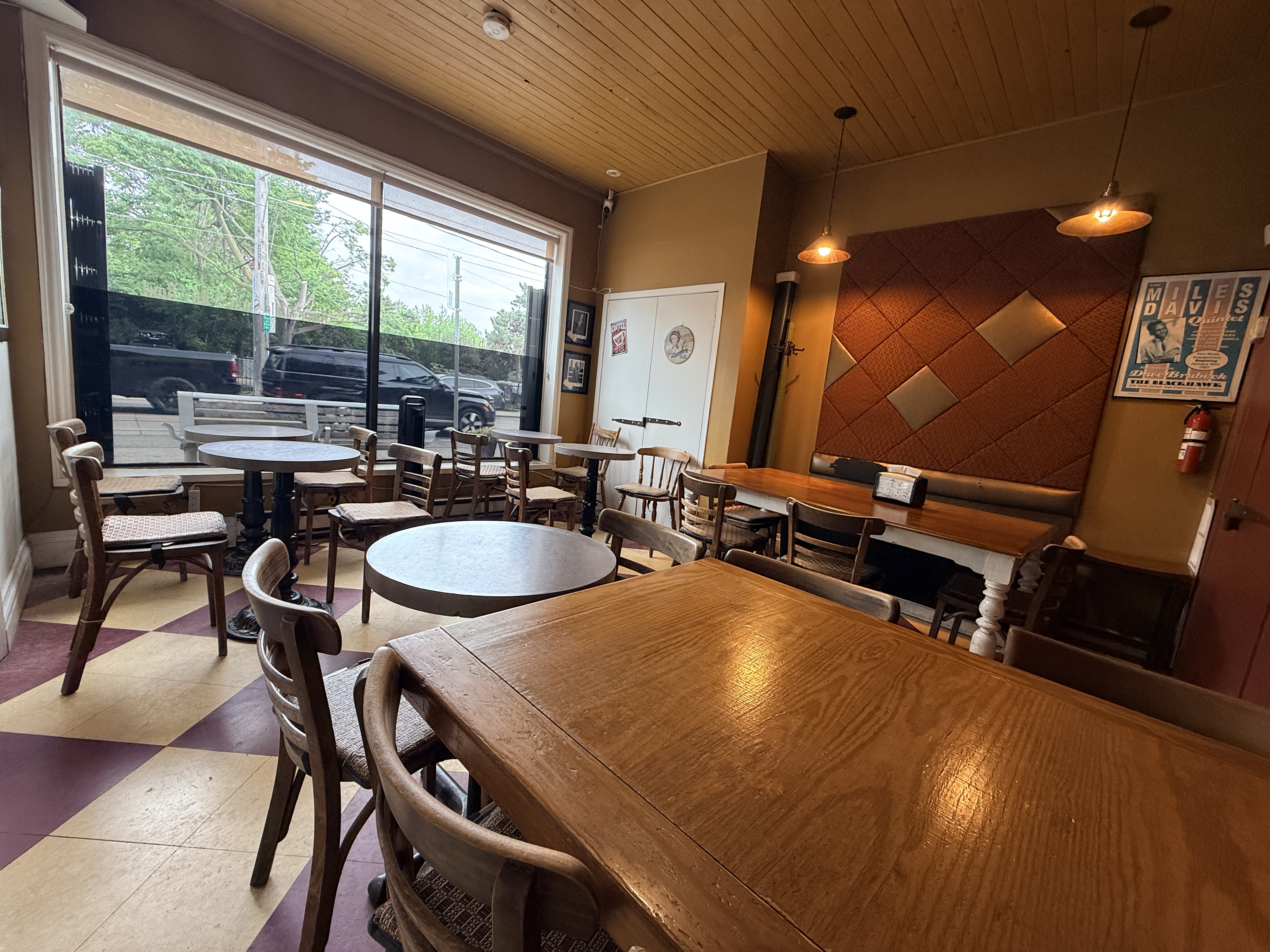Warm seating room inside Coffee and All That Jazz